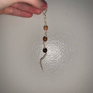 Brown boho tan and cream colored beads with hemp/twine knotted string keychain